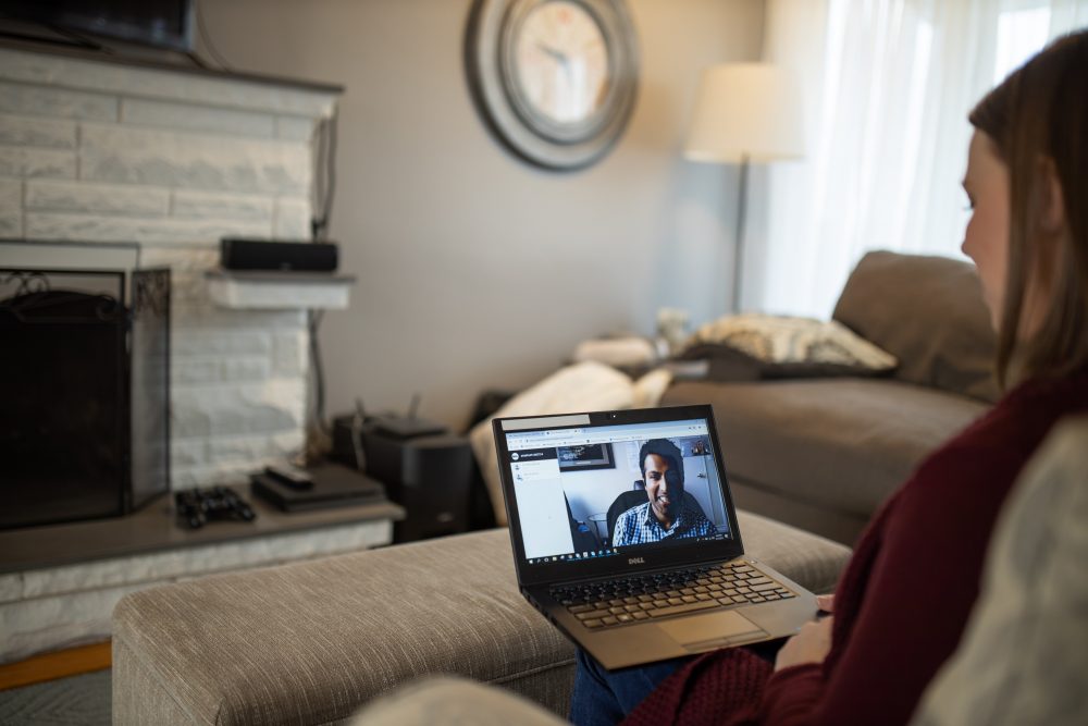 Woman telecommuting with laptop